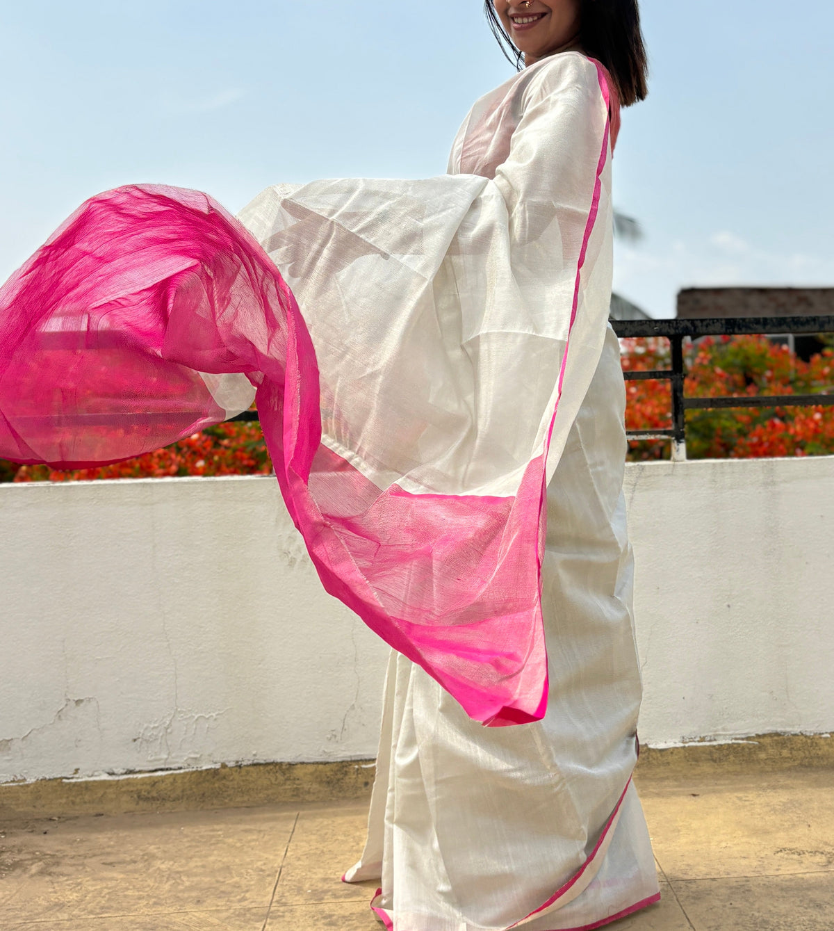 Silver & pink tissue silk saree β pallu in motion | SUTA-SAGA