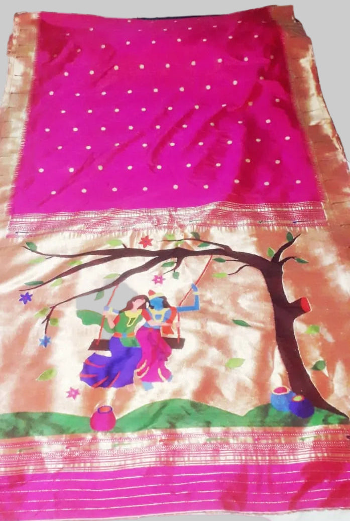 Saree with a colorful design on a patterned fabric background
